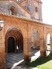 Darwin at door of church on the way during a rest break