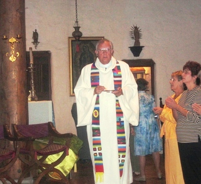 Fr. Douglas serving Communion